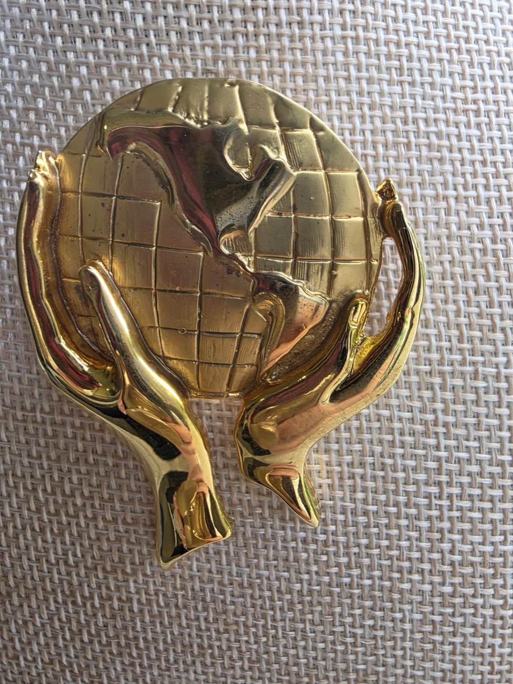 Source Unknown Gold Hands Holding Globe Brooch Pin